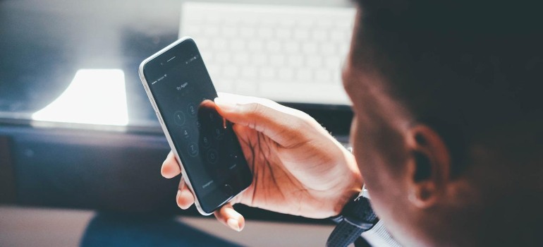 A man holding a phone.