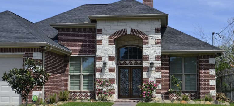 A view of a house as an example of how a clean roof boosts home value.