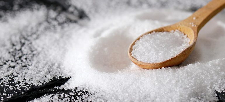 Sea salt to use to remove weeds from artificial grass.