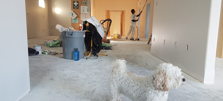 A person making repairs in home as a symbol of how to prepare your Summerlin home for sale