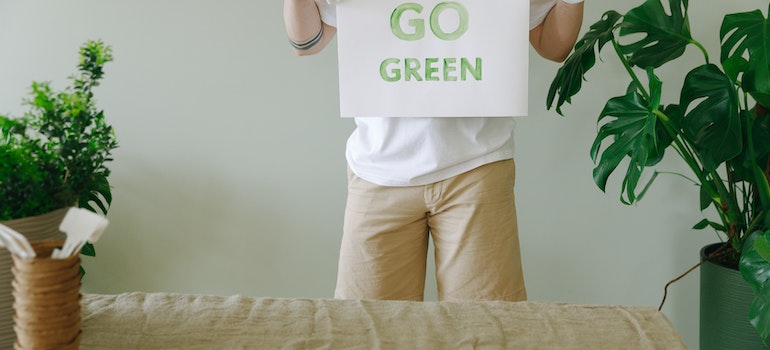 Go green sign as a symbol of how solar battery protects your Henderson home