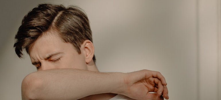 A person coughing